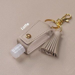 Keychain with hand sanitizer empty plastic bottle